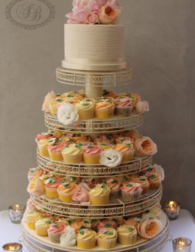 Wedding cupcake tower in peach and apricot colours