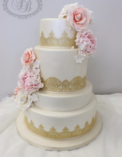 Gold sugar lace wedding cake with sugar peonies and roses