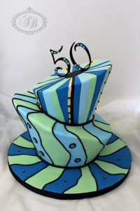 Mint and blue topsy turvy cake