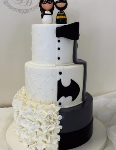 Bride and Batman groom wedding cake