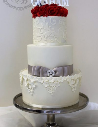 3 tier wedding cake with damask, blossom fade and red roses