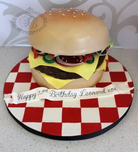 3D cheeseburger cake with checkered board