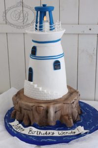 3D blue and white lighthouse cake