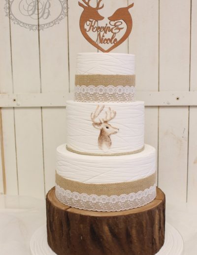 Woodland stag scribed fondant wedding cake