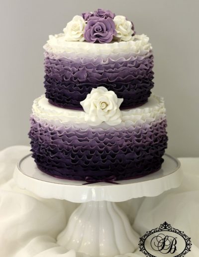 2 tier purple to white ombre ruffle wedding cake