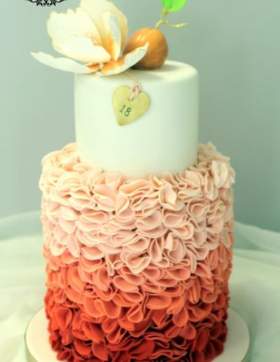Peach ruffle 18th birthday cake with peach and flower