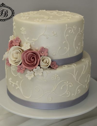 Piped 2 tier wedding cake with dusty pink & white sugar flowers
