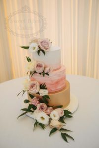 Watercolour and gold wedding cake