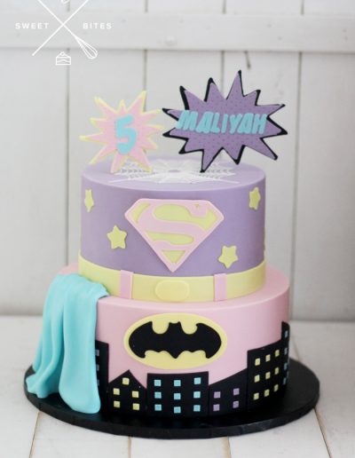 pink purple superman batman DC cake 5th birthday
