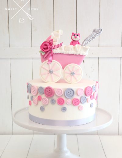 baby shower cake girl pink teddy bear pram buttons