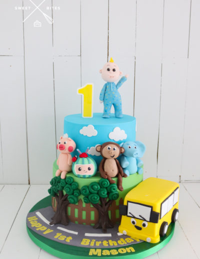 cocomelon baby bus characters 1st birthday 2 tier cake