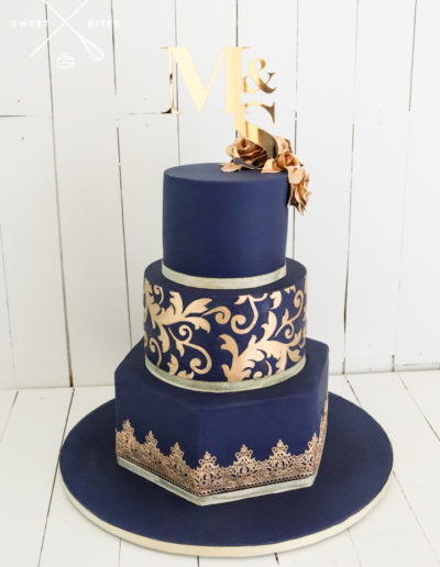 navy gold flourish sugar lace roses hexagon wedding cake