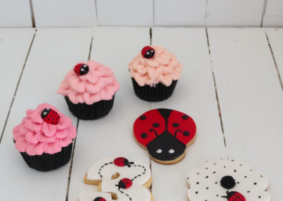 pink cupcakes with ladybird cookies ladybug 3 shaped flower shaped