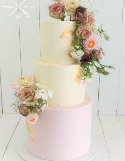 pink gold white wedding cake ganache smooth flowers