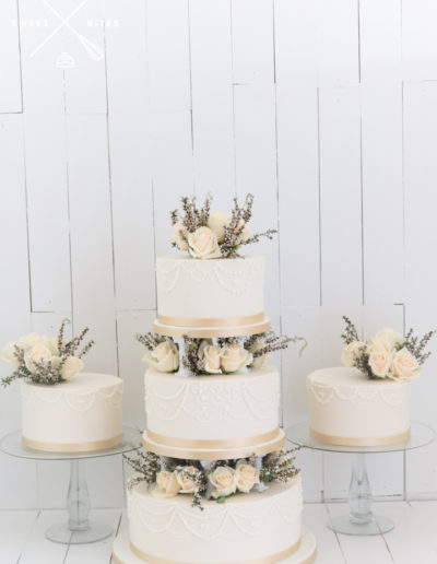 pillar wedding cake roses gifting cakes stand ivory gold tear drop hand piping
