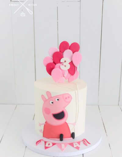 pink peppa pig balloons cake