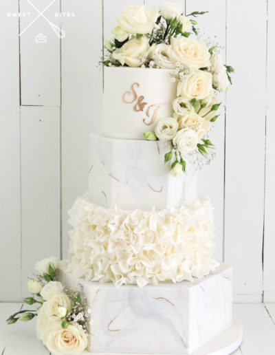 white grey gold marble hexagon wedding cake ruffles